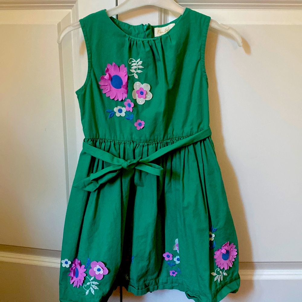 Adorable green dress with purple flowers. Gently worn. Underneath tutu included